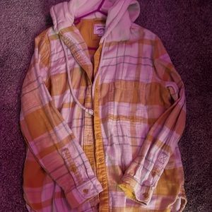 This is a mustard yellow plaid shirt with a good and it is very soft!!